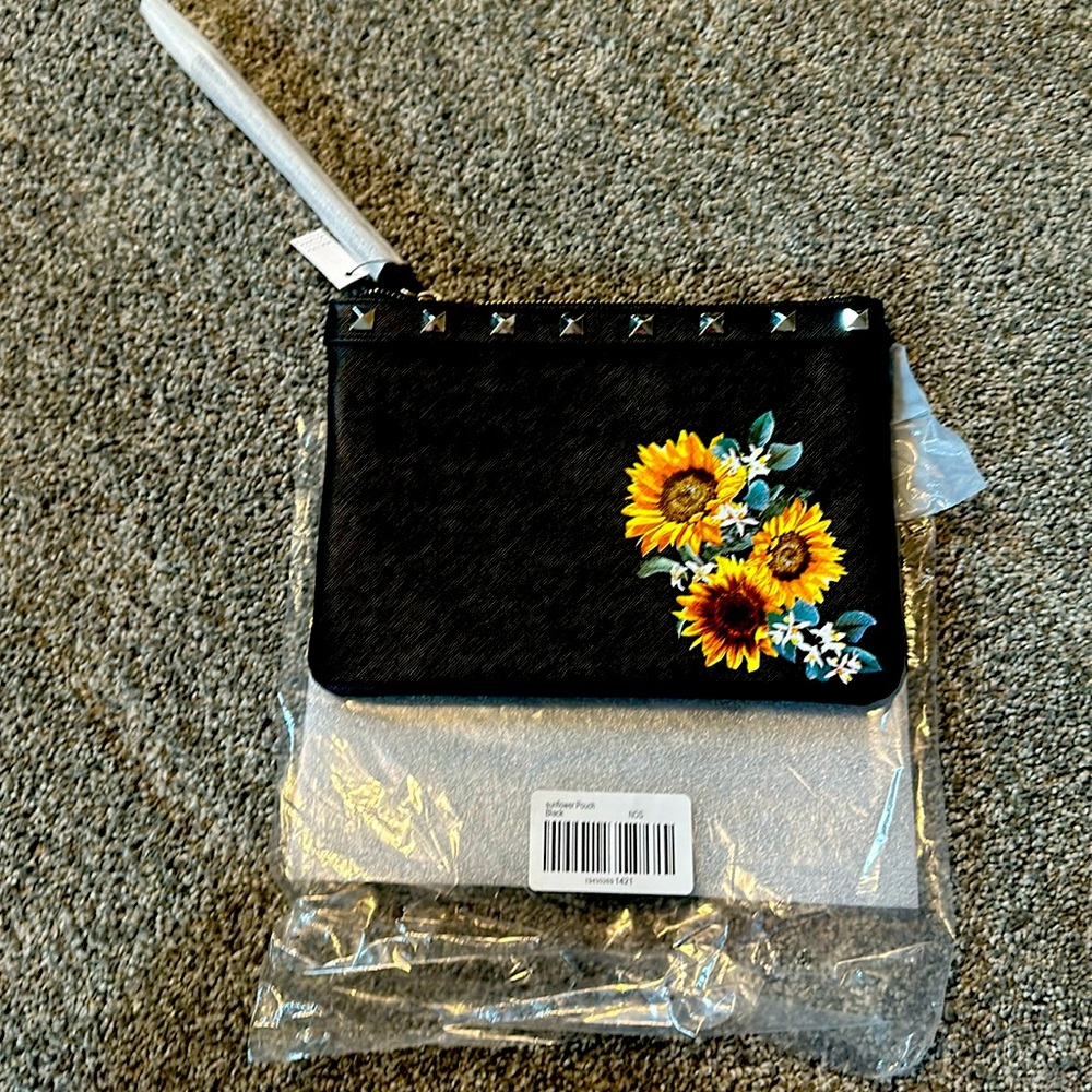 White House Black Market sunflower pouch.  New with Tags!